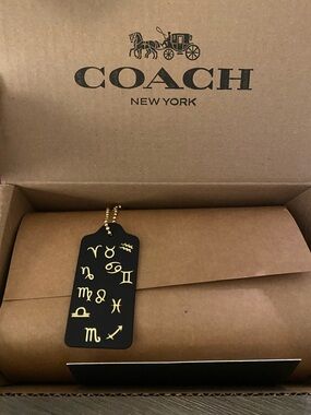 Coach Large Hangtag in Black Leather and Gold Zodiac Monogram